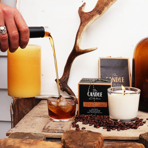 The Candle Kitchen coffee candle with coffee beans and caramel sauce