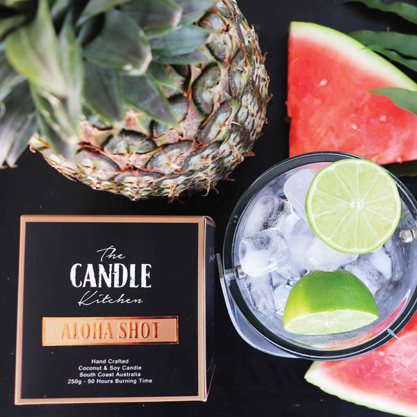 The ultimate refresher of triple coconut, sweet watermelon, papayas, and lime. An irresistible classic. Aloha Shot Candle from the Candle Kitchen.