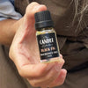 Black Fig fragrance oil The Candle kitchen, A small clear bottle of Black Fig Fragrance Oil with a black dropper cap, labeled 'the candle kitchen Black Fig 10ml'.