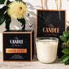 South Coast Soy Candle The Candle kitchen, with packaging and decorative elements on a wooden surface.