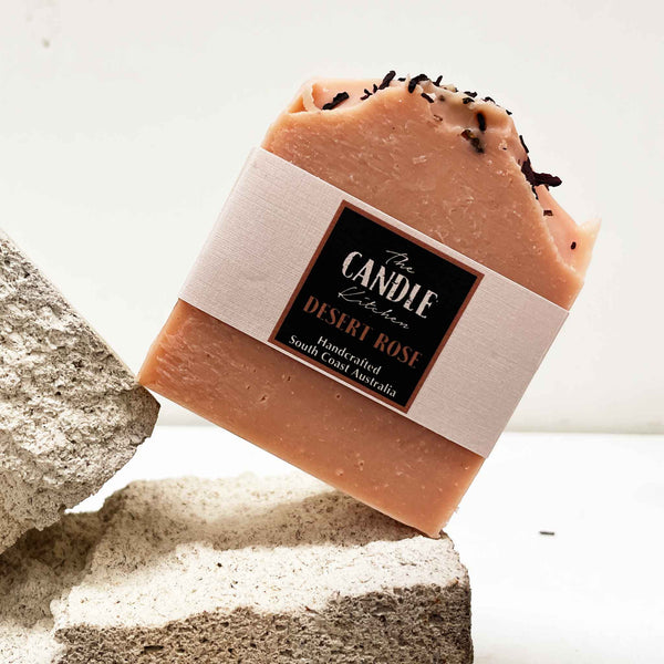 Bar of soap with a visible label on a textured surface